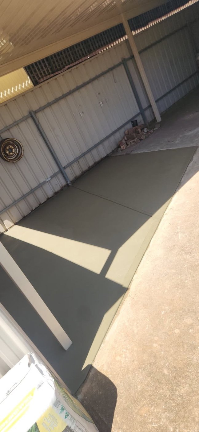 Finished concrete pad for a residential shed or utility area